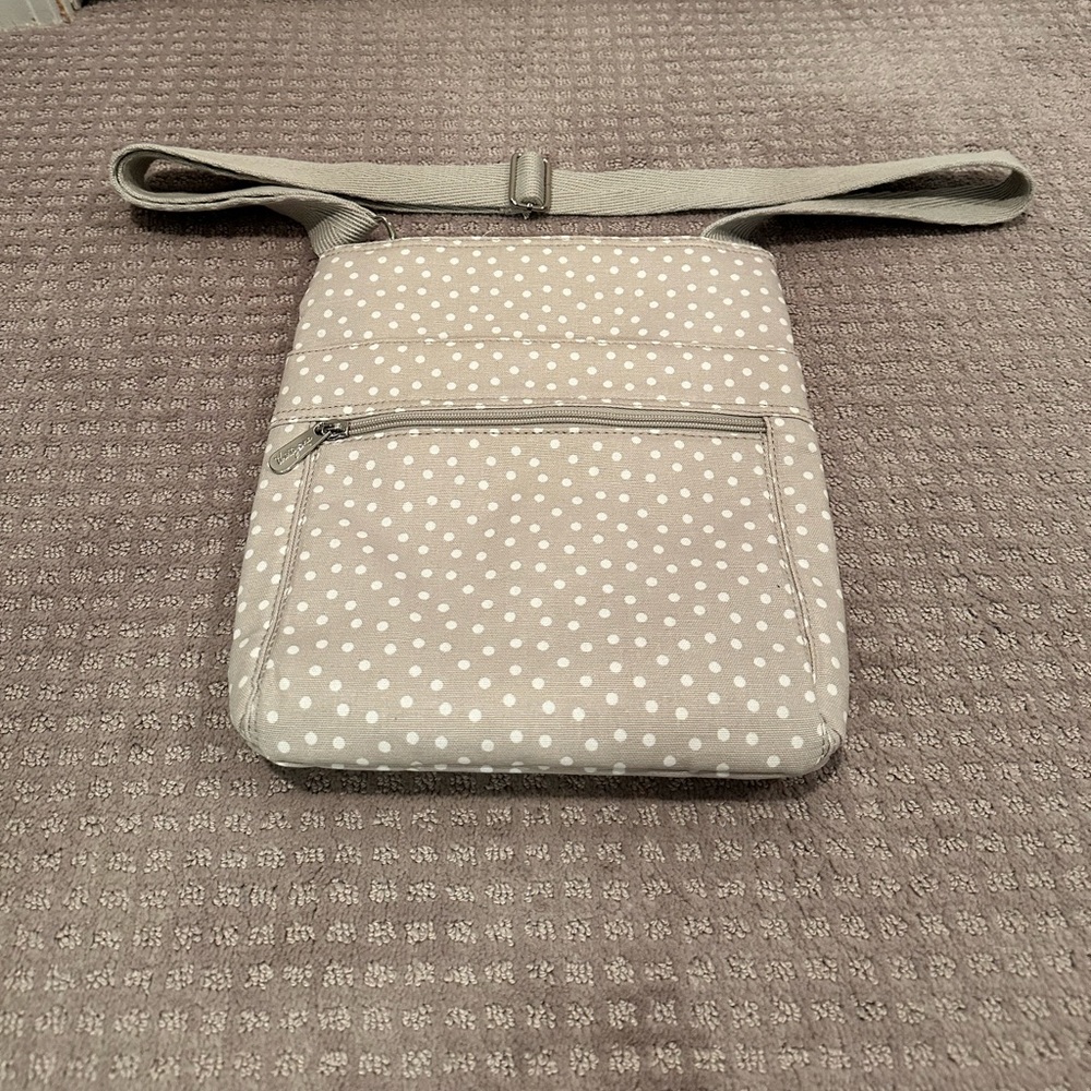 Thirty-one Crossbody purse neutral with white polka dots. Like new, never used